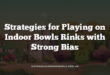 Strategies for Playing on Indoor Bowls Rinks with Strong Bias